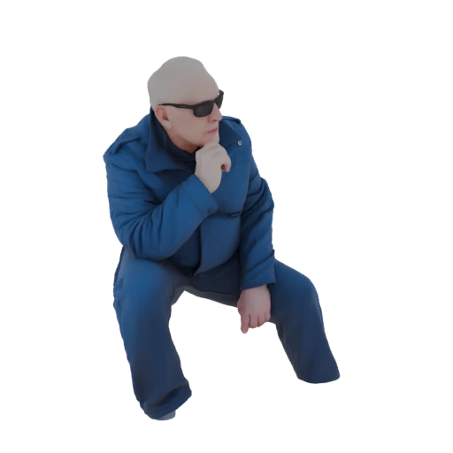 Bald Man in Blue Jumpsuit Sitting