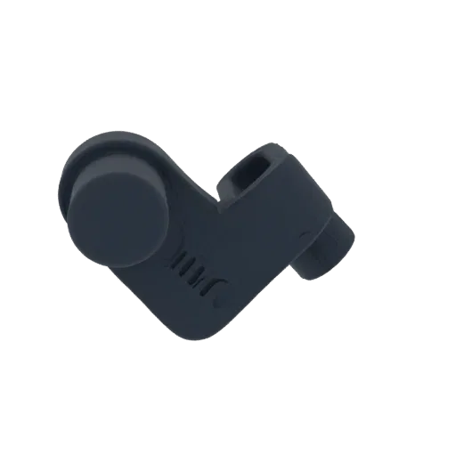 A 3D render of a dark gray angled connector with a circular cap on one end and detailed internal grooves.