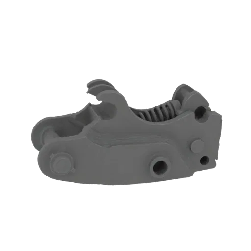 3D model of a gray excavator quick coupler with visible locking jaws and spring mechanism.
