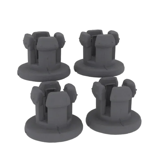 Un ensemble de quatre miniatures de tours de château grises rendues en 3D, avec des sommets crénelés et des bases circulaires