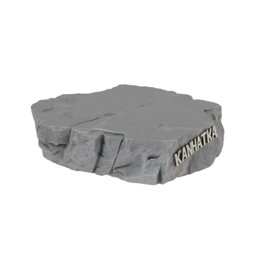3D model of a grey, textured rock base with 'Kamchatka' inscribed on the side, suitable for dioramas and 3D printing.