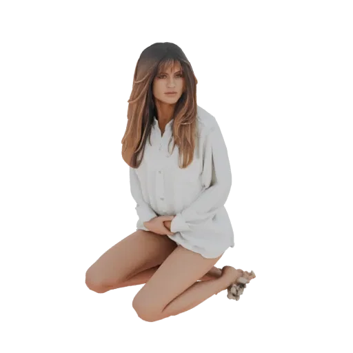 3D model of a woman kneeling, wearing a white oversized shirt, with her hands clasped in her lap.