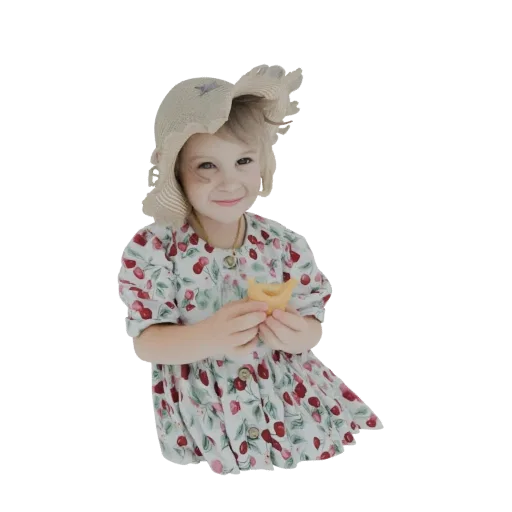 3D model of a smiling young girl wearing a straw sun hat and a white dress with a cherry print, holding a small pastry.