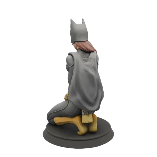 3D model of Batgirl kneeling, viewed from the back, wearing her grey costume and cape.