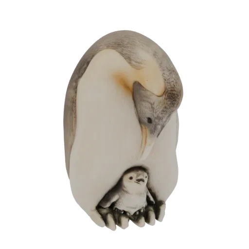 3D model of an Emperor Penguin with its chick nestled under its wing, rendered in a smooth, stone-like texture.