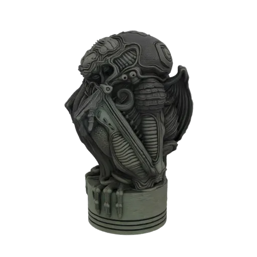 A detailed 3D model of a Giger-esque alien bust with biomechanical features, displayed on a textured base.