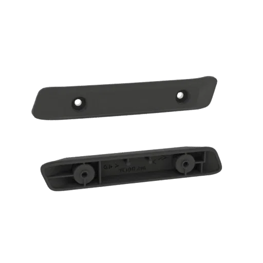 Two dark gray plastic mounting brackets, one above the other, against a black background.
