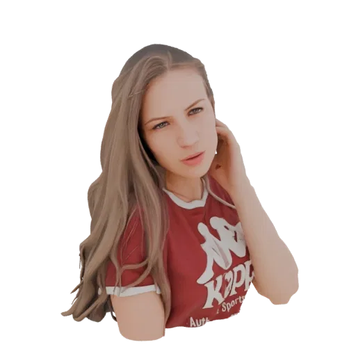 3D model of a young woman with long blonde hair, wearing a red Kappa t-shirt, looking towards the viewer with her hand near h
