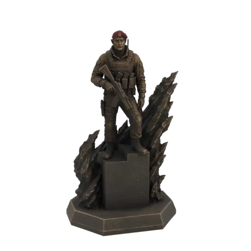 3D model of a bronze soldier in tactical gear holding a rifle, standing on a textured rocky base.