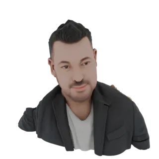3D model render of a stylized man's bust wearing a black blazer and white t-shirt, with dark hair and a slight smile.